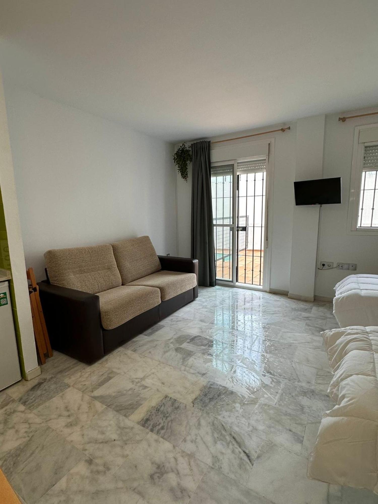 Apartahotel Dona Reyes Chipiona Buitenkant foto